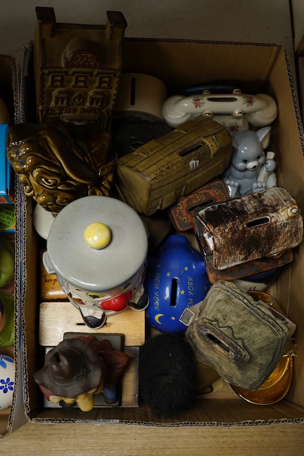 A large quantity (in three boxes) of novelty, advertising and general money boxes mostly from the mid to late 20th century, tallest a clown Ellgreave money box 27cm high. Condition - varied from poor to good